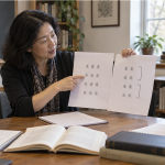 A literature instructor guiding students through the four-line structure of a classical Chinese poem